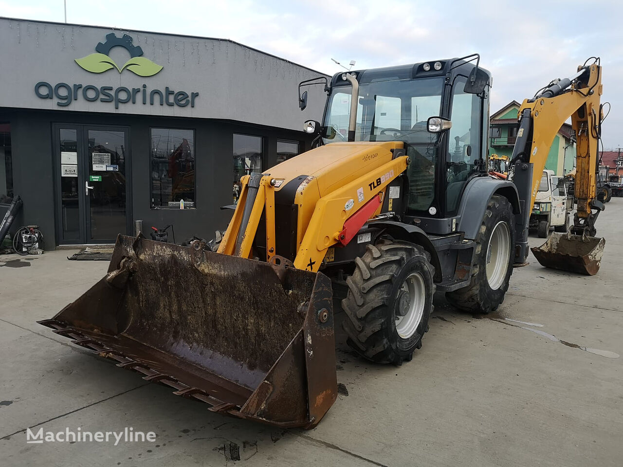 екскаватор-навантажувач Terex TLB 890