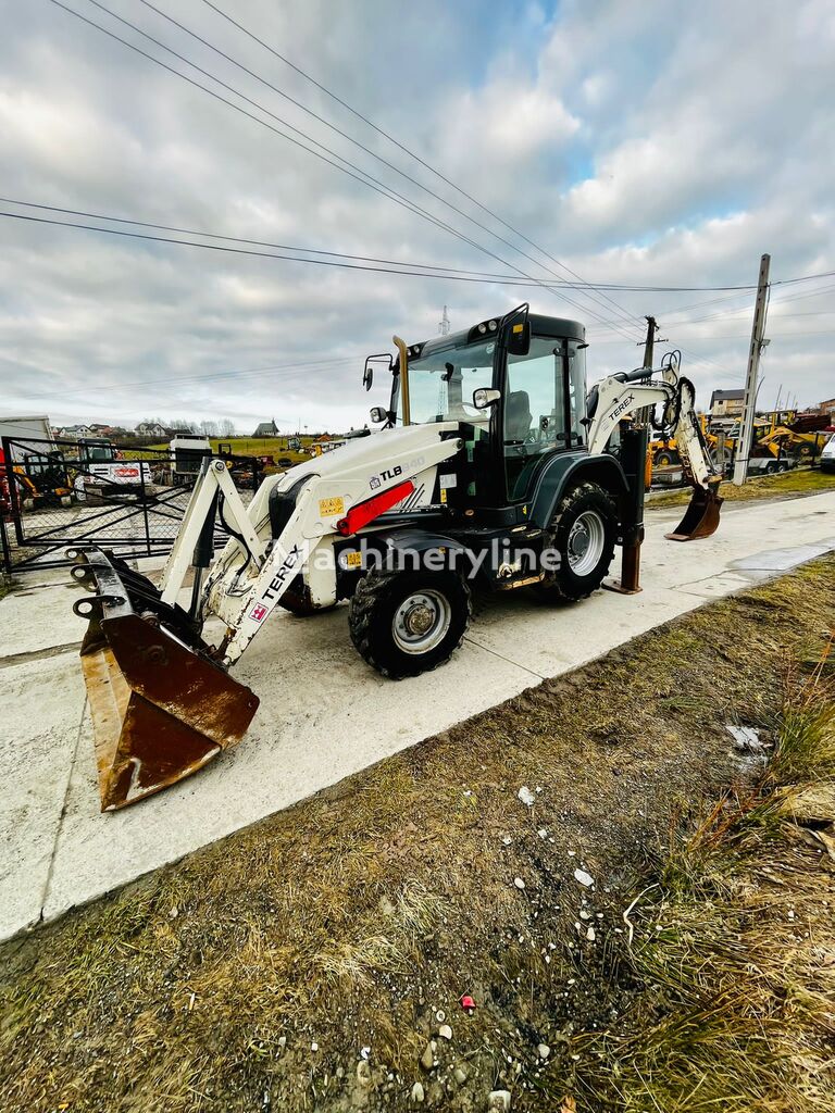 екскаватор-навантажувач Terex TLB840SM