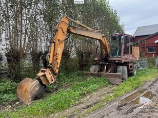 колісний екскаватор Case Poclain 61P Wheel excavator w/ 2 buckets