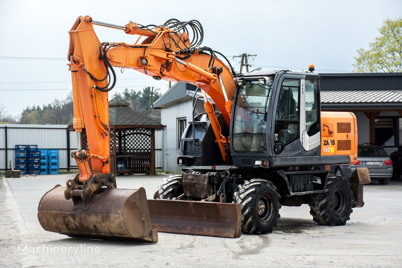 колісний екскаватор Hitachi Zaxis ZX 140 W / 2011 / 2 łyżki / Świeżo sprowadzona z Francji