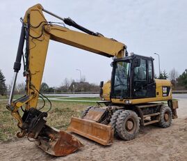 колесный экскаватор Caterpillar M315